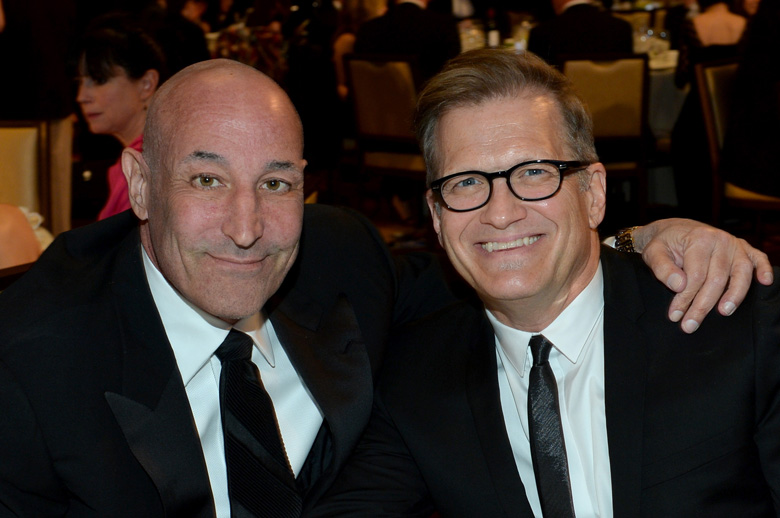 Simon pictured with Drew Carey in 2013. (Getty)