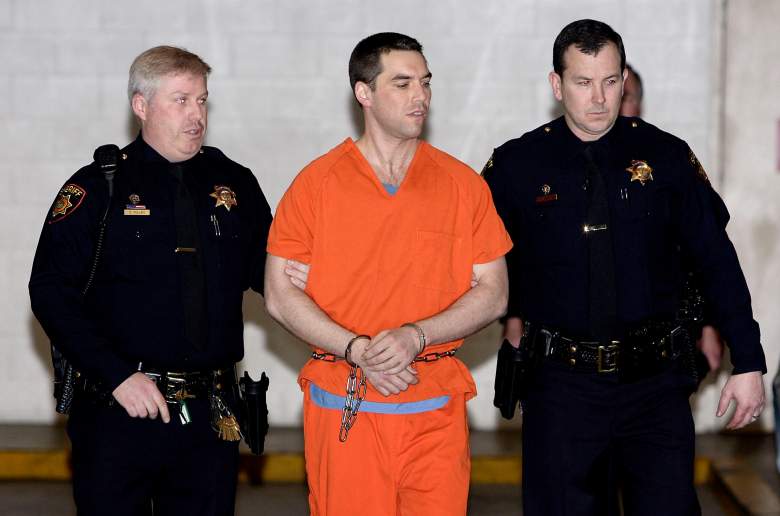 REDWOOD CITY, CA - MARCH 17: Convicted murderer Scott Peterson is escorted by two San Mateo County Sheriff deputies as he is walked from the jail to an awaiting van March 17, 2005 in Redwood City, California. Scott Peterson was transported to San Quentin Prison death row after he was formally sentenced to death for the murder or his wife Laci and their unborn son. (Photo by Justin Sullivan/Getty Images)