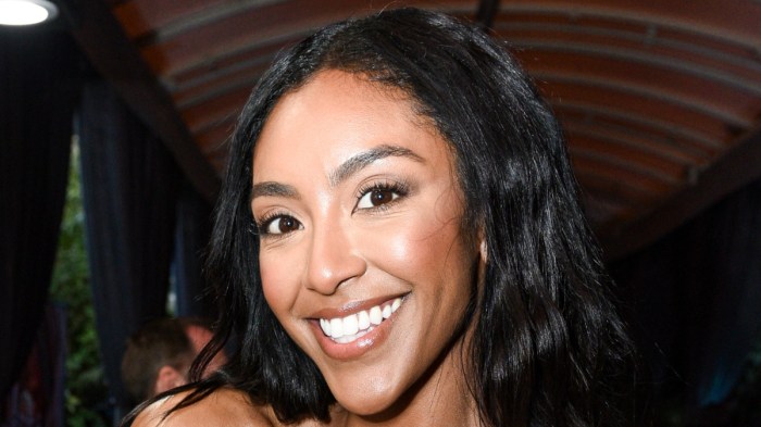 Tayshia Adams smiling