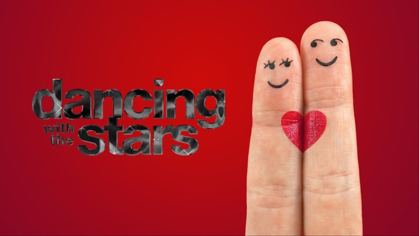 Fingers with a heart drawn on them.