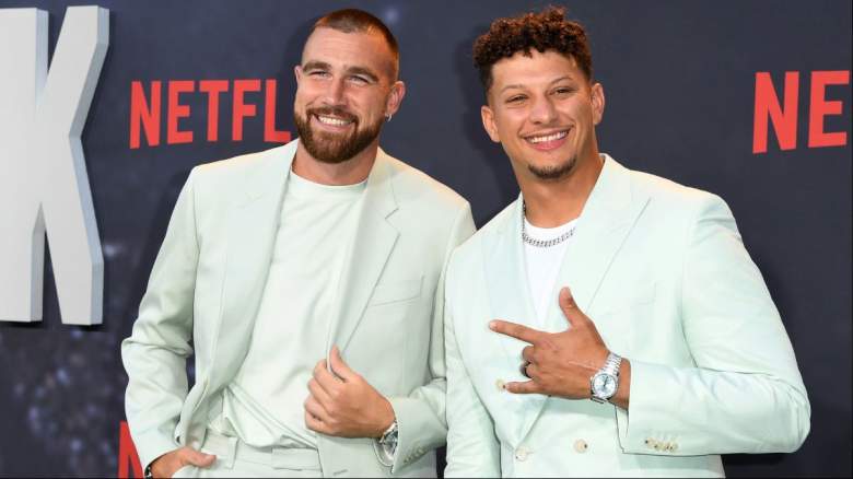 Travis Kelce and Patrick Mahomes pose on the red carpet at the Netflix premiere of Quarterback.