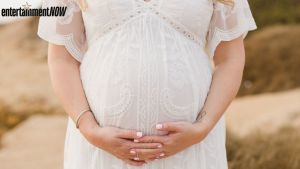 She's pregnant with twins!