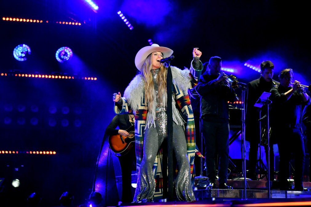 Lainey Wilson performing on stage