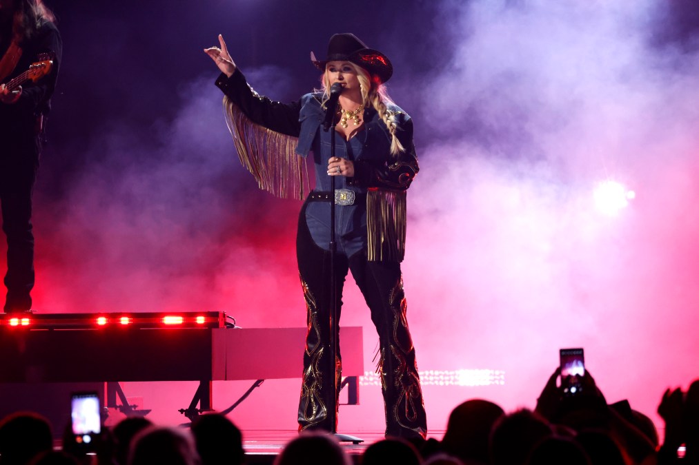 Miranda Lambert singing into a microphone