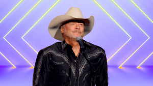 Alan Jackson behind a microphone