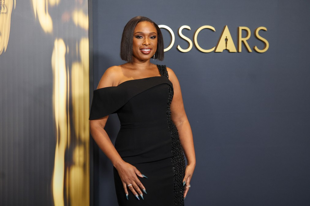 Jennifer Hudson posing in a black dress