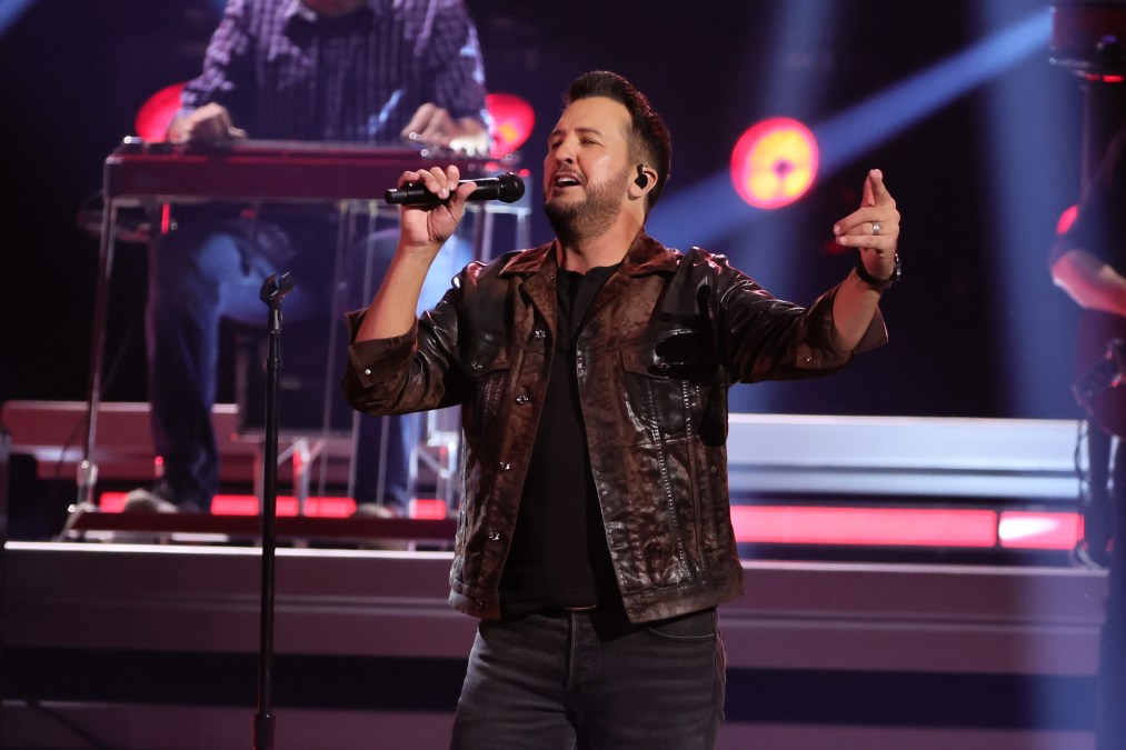 Luke Bryan singing on stage
