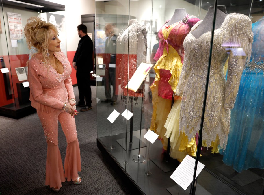 Dolly Parton views exhibit 'Dolly Parton: Journey of a Seeker' at Country Music Hall of Fame and Museum
