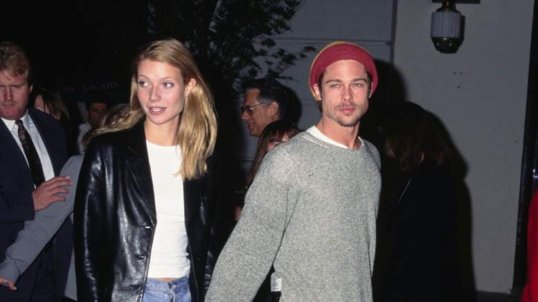 Gwyneth Paltrow, wearing a black leather jacket over a white t-shirt with jeans, and her partner, American actor Brad Pitt