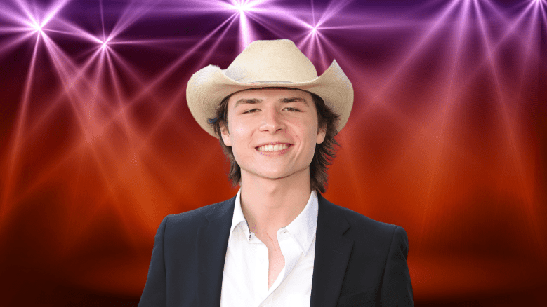 John Foster posing in a cowboy hat