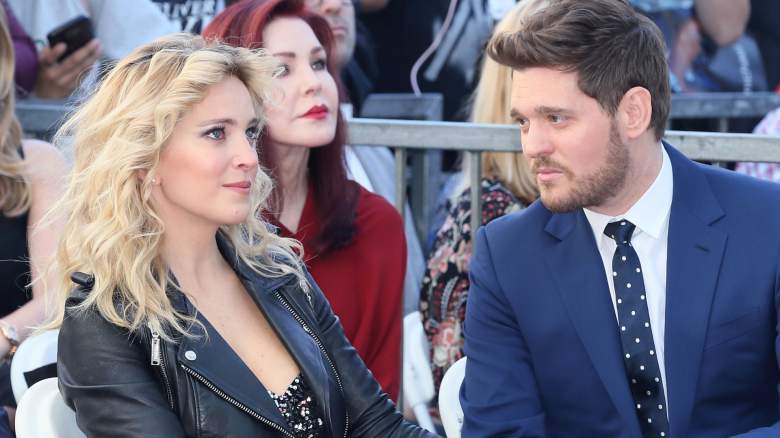 Michael Buble looking at his wife Luisana Lopilato