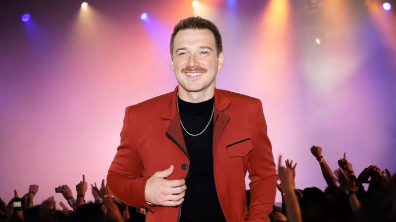 Morgan Wallen posing in front of a crowd
