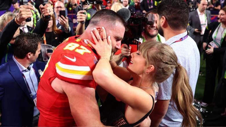 Travis Kelce #87 of the Kansas City Chiefs celebrates with Taylor Swift after defeating the San Francisco 49ers 25-22 in overtime during Super Bowl LVIII