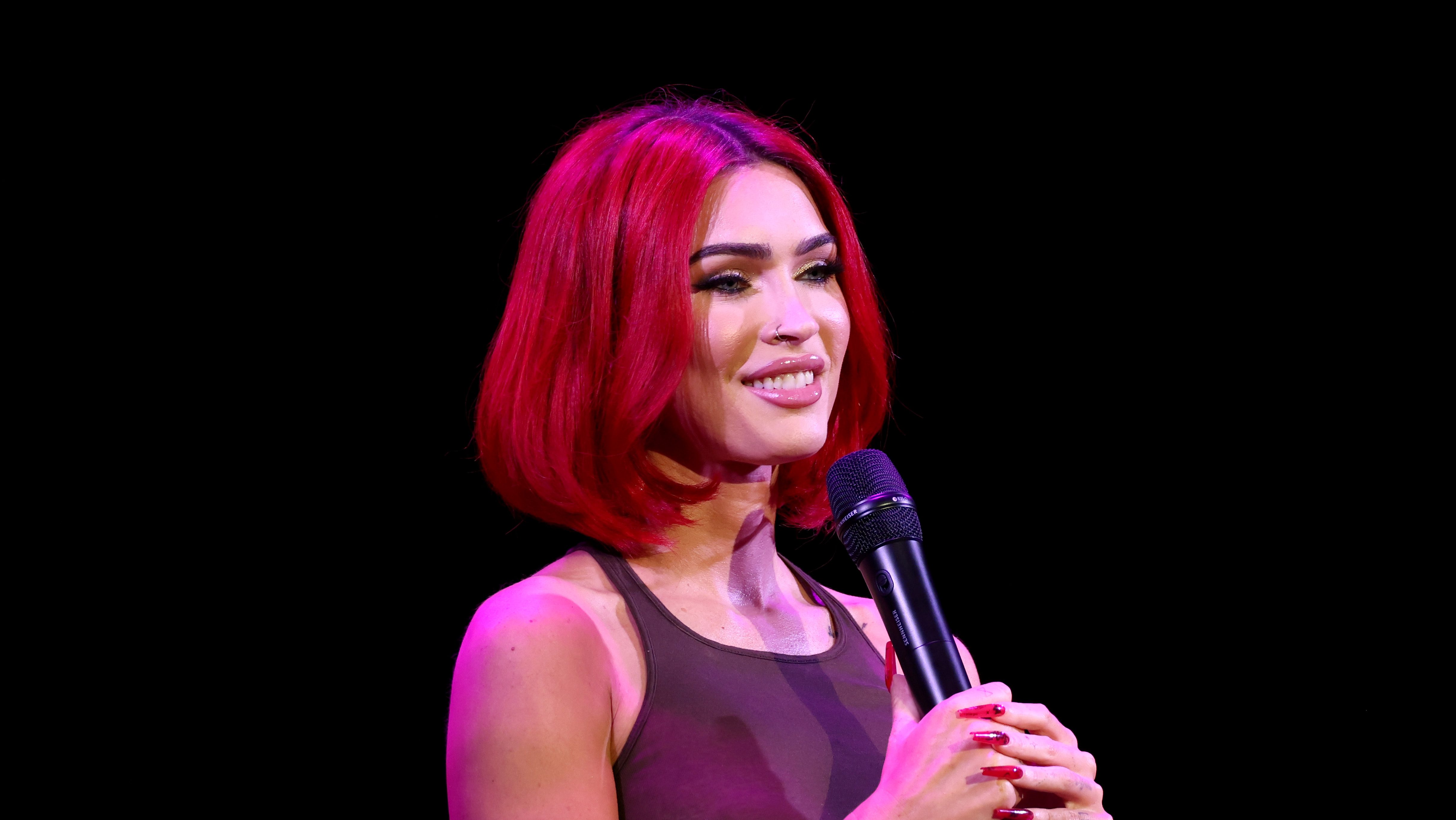 Megan Fox speaks at an event