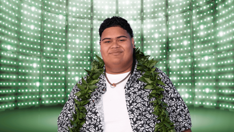 Iam Tongi posing on stage