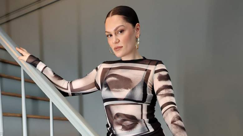 Jessie J poses for a photo on stairs