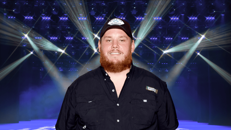 Luke Combs posing on stage