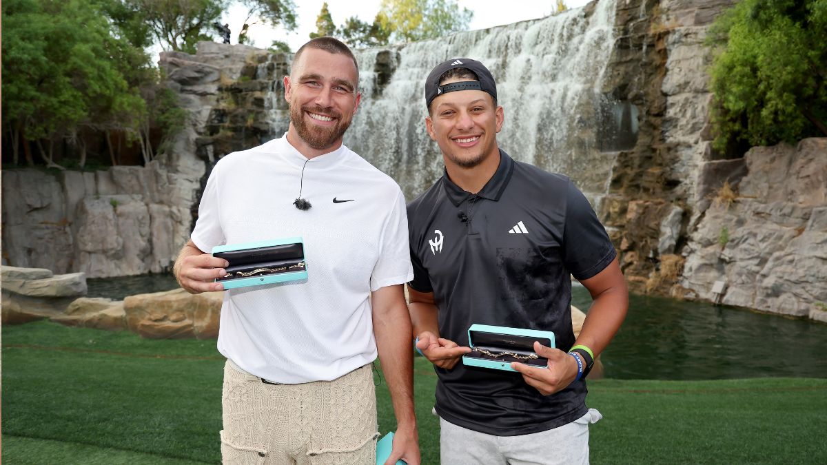 Travis Kelce (L) and Patrick Mahomes pose for photos after winning Capital One's The Match VIII - Curry & Thompson vs. Mahomes & Kelce at Wynn Golf Club on June 29, 2023 in Las Vegas, Nevada