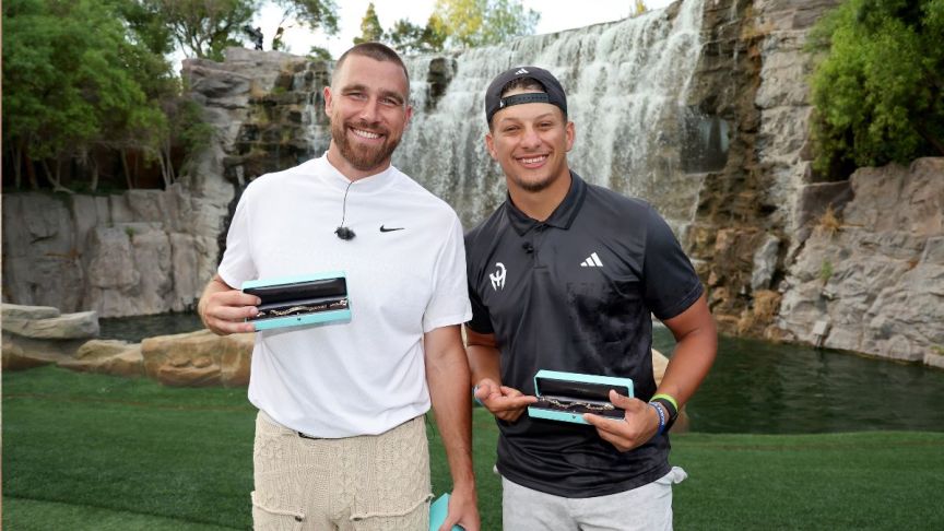 Travis Kelce (L) and Patrick Mahomes pose for photos after winning Capital One's The Match VIII - Curry & Thompson vs. Mahomes & Kelce at Wynn Golf Club on June 29, 2023 in Las Vegas, Nevada