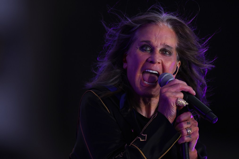 Ozzy Osbourne singing on stage