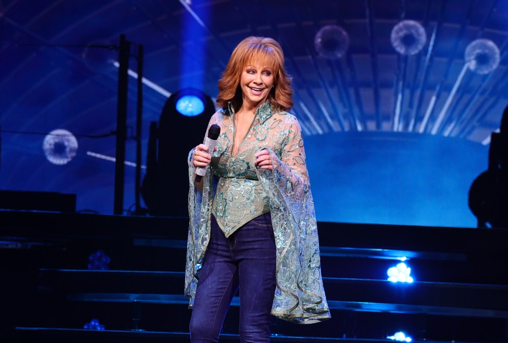Reba McEntire performing on stage