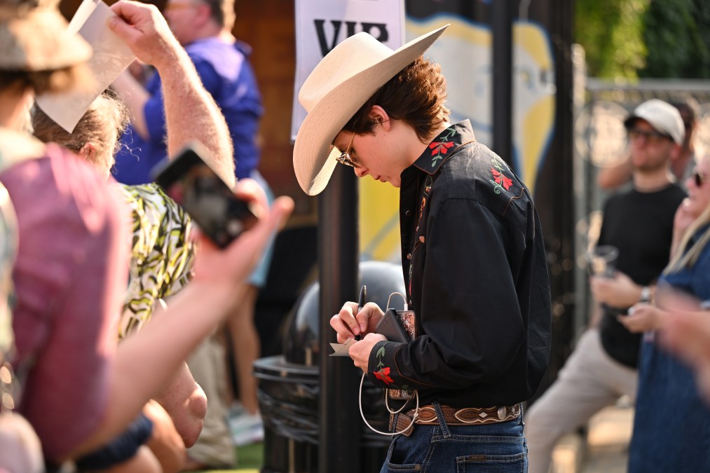 John Foster signing autographs