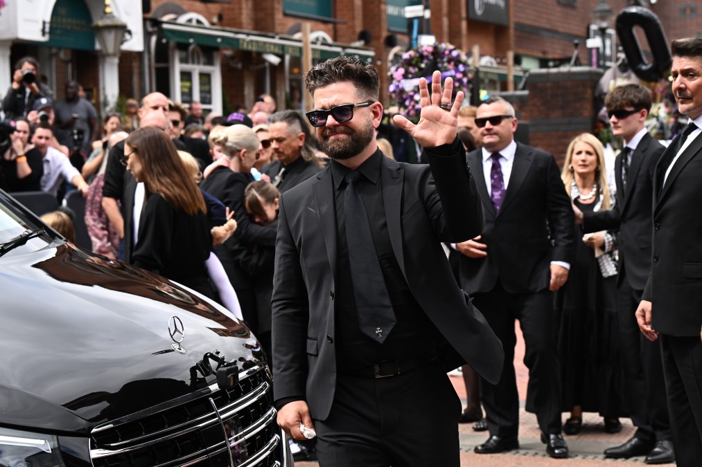 Jack Osbourne greets fans as he arrives to view tributes 
