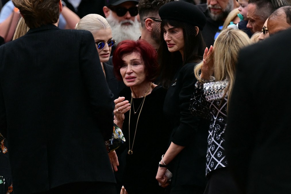 Ozzy Osbourne's widow Sharon Osbourne (C) reacts at the Black Sabbath Bridge bench