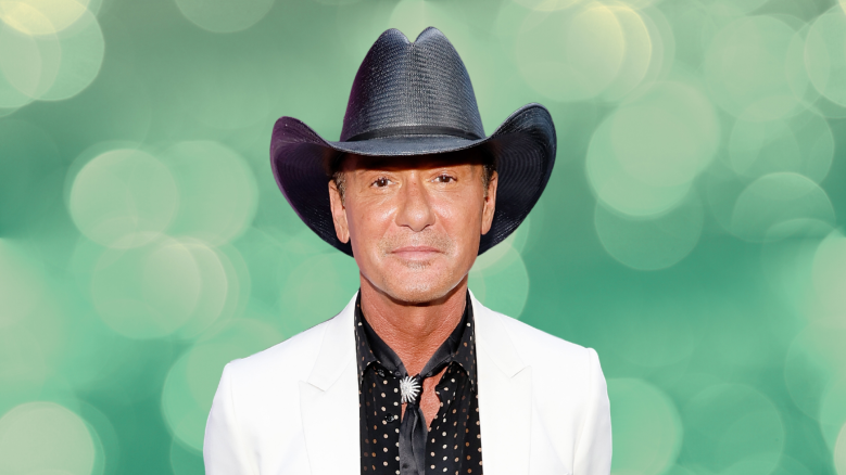 Tim McGraw posing in a black cowboy hat