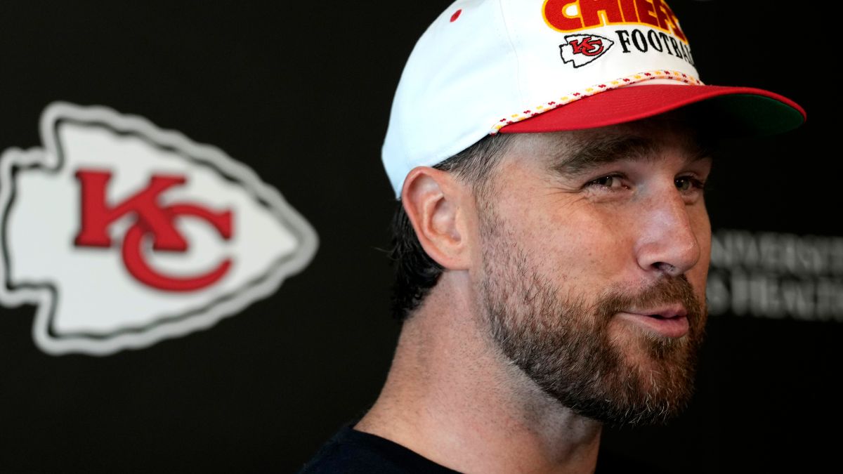 Travis Kelce #87 of the Kansas City Chiefs talks with the media after a mandatory minicamp at The University of Kansas Health System Training Complex on June 18, 2025