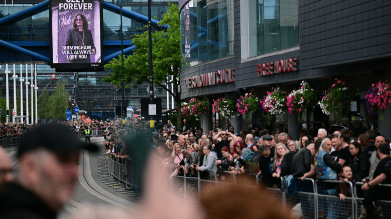 Mourners and music fans line the streets to pay their respects ahead of the funeral cortege of Ozzy Osbourne