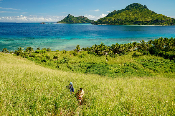 Deshawn Radden and Evvie Jagoda explore Fiji's Mana Island on "Survivor 41"