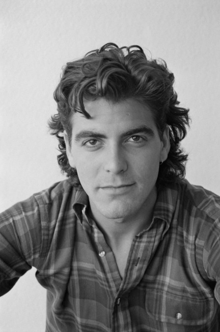 American actor George Clooney wearing a checked shirt during a studio portrait session