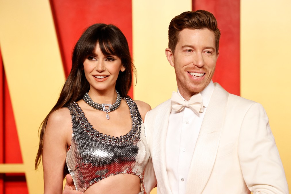 Canadian actress Nina Dobrev (L) and US former snowboarder Shaun White