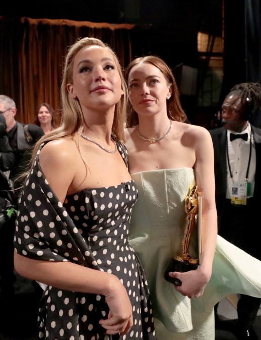  Jennifer Lawrence and Emma Stone are seen backstage during the 96th Annual Academy Awards