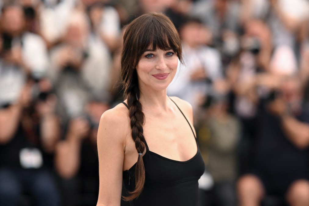 US actress Dakota Johnson posea during a photocall