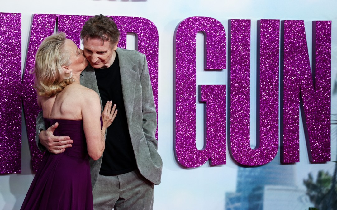 US actress Pamela Anderson (L) and British actor Liam Neeson