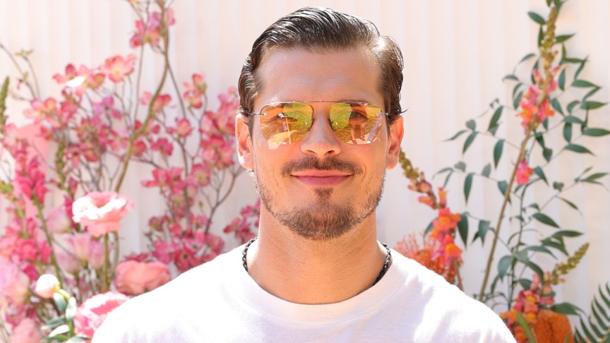 Gleb Savchenko wearing sunglasses and smiling at an event