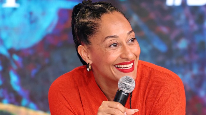 Tracee Ellis Ross smiling with microphone