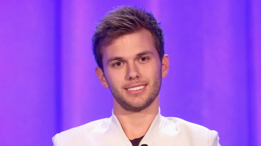 Chase Chrisley smiling at an event