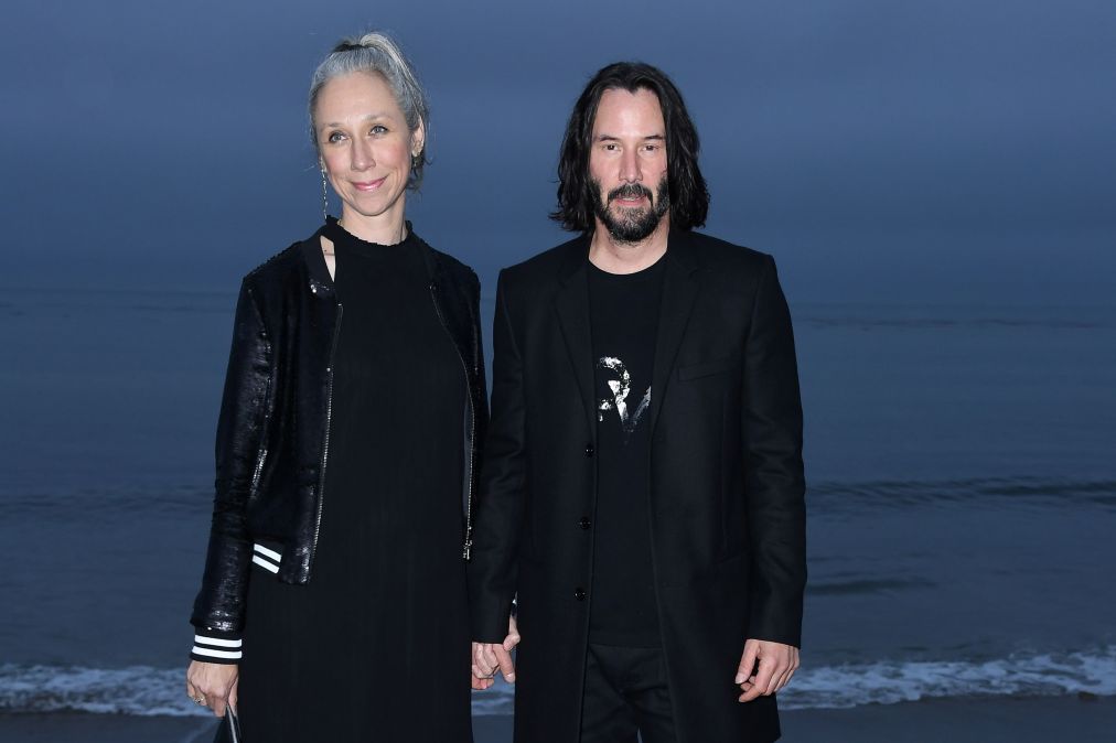 Keanu Reeves (R) and US artist Alexandra Grant