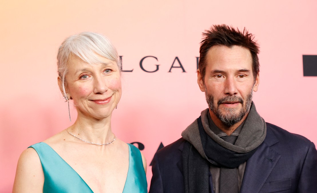 US visual artist Alexandra Grant (L) and US actor Keanu Reeves (R)