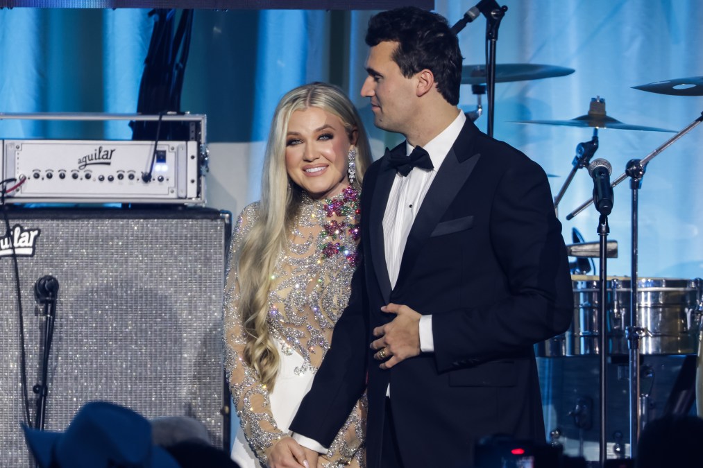 Charlie Kirk (R) and and his wife Erika Lane Frantzve