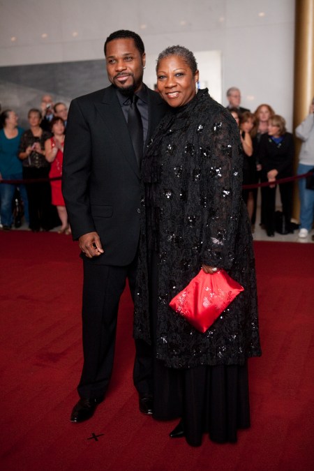 Actor Malcolm-Jamal Warner (L) poses for photographers with his mother Pamela Warner