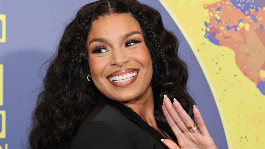 Jordin Sparks smiling and waving