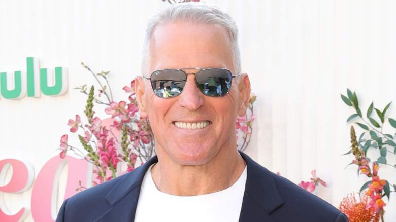 Mel Owens smiling and wearing sunglasses