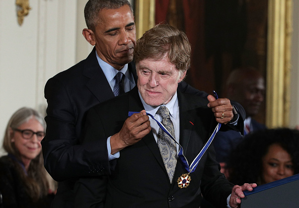 President Barack Obama presents the Presidential Medal of Freedom to Robert Redford
