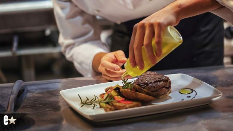 A chef making a dish