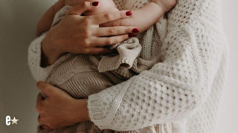 Mother holding her baby