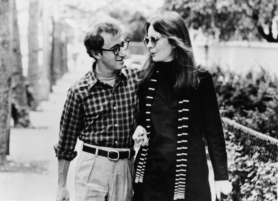 American actors Diane Keaton and Woody Allen walk along a street and talk in a scene from 'Annie Hall,' directed by Allen, New York, New York, 1977.